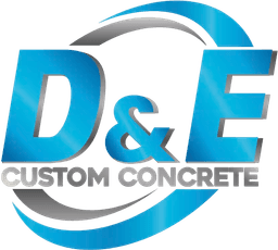 D&E Custom Concrete logo featuring elegant blue and silver design elements.